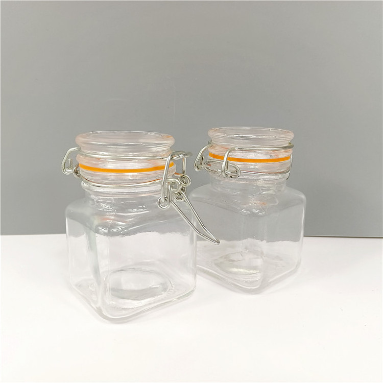 Manufacturer Wholesale 100 ml Square Shaped Food Storage Empty Food Tea Candy Glass Jar with Swing Top