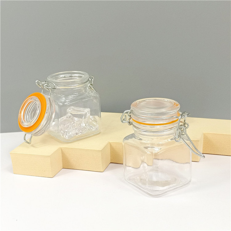 Manufacturer Wholesale 100 ml Square Shaped Food Storage Empty Food Tea Candy Glass Jar with Swing Top