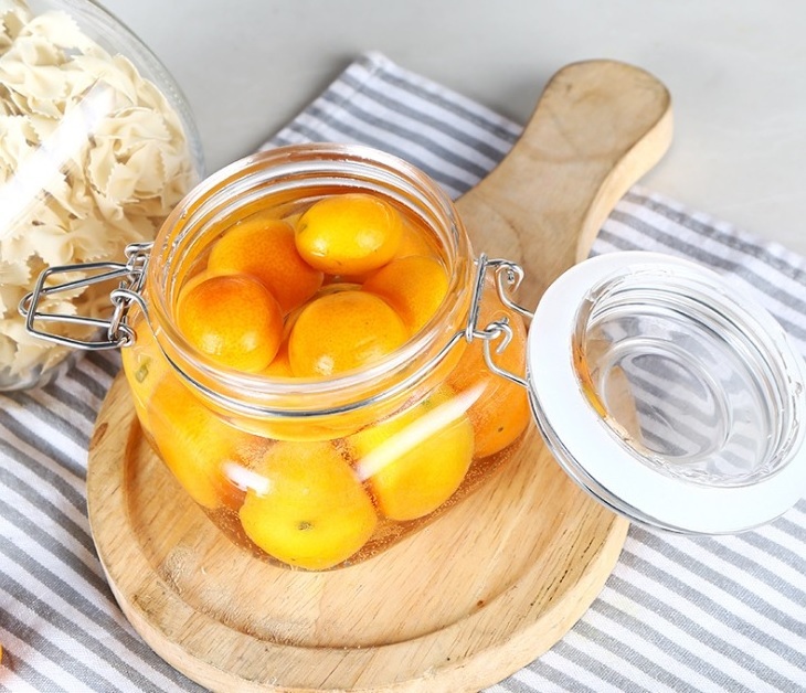 high quality round recycled glass jars  with hinged lids swing top glass storage jar