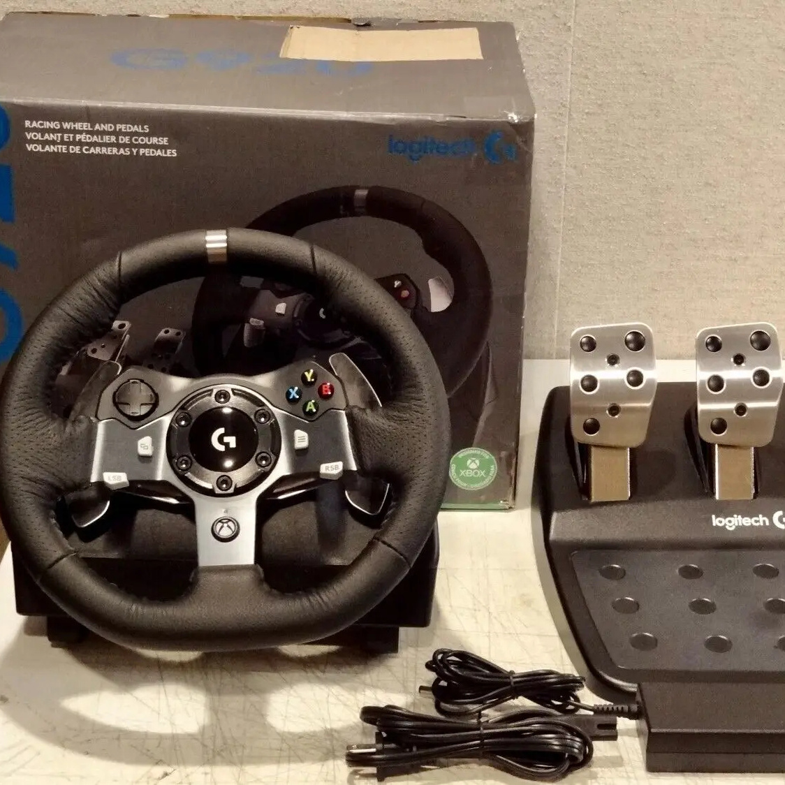 Wholesales Price On Logitechs G920 Driving Force Racing Wheel And Pedals, Factory Sealed Comes with 1 Year Warranty.