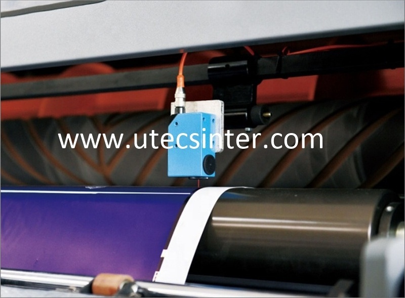 UCM1400A Automatic kraft jumbo printed paper roll to sheet cutting machine guillotine reel cross cutter