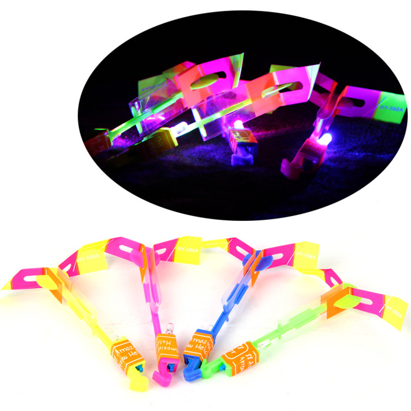 2020 new premium wholesale Rotating Flying Toys light up toys LED Light up Arrow Rocket Helicopter