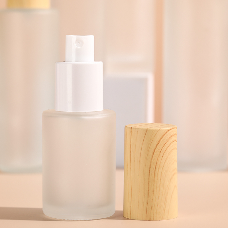 30ml 60ml 90ml 120ml bamboo cosmetic packaging customized frosted glass boston round lotion serum pump bottle with wooden lid