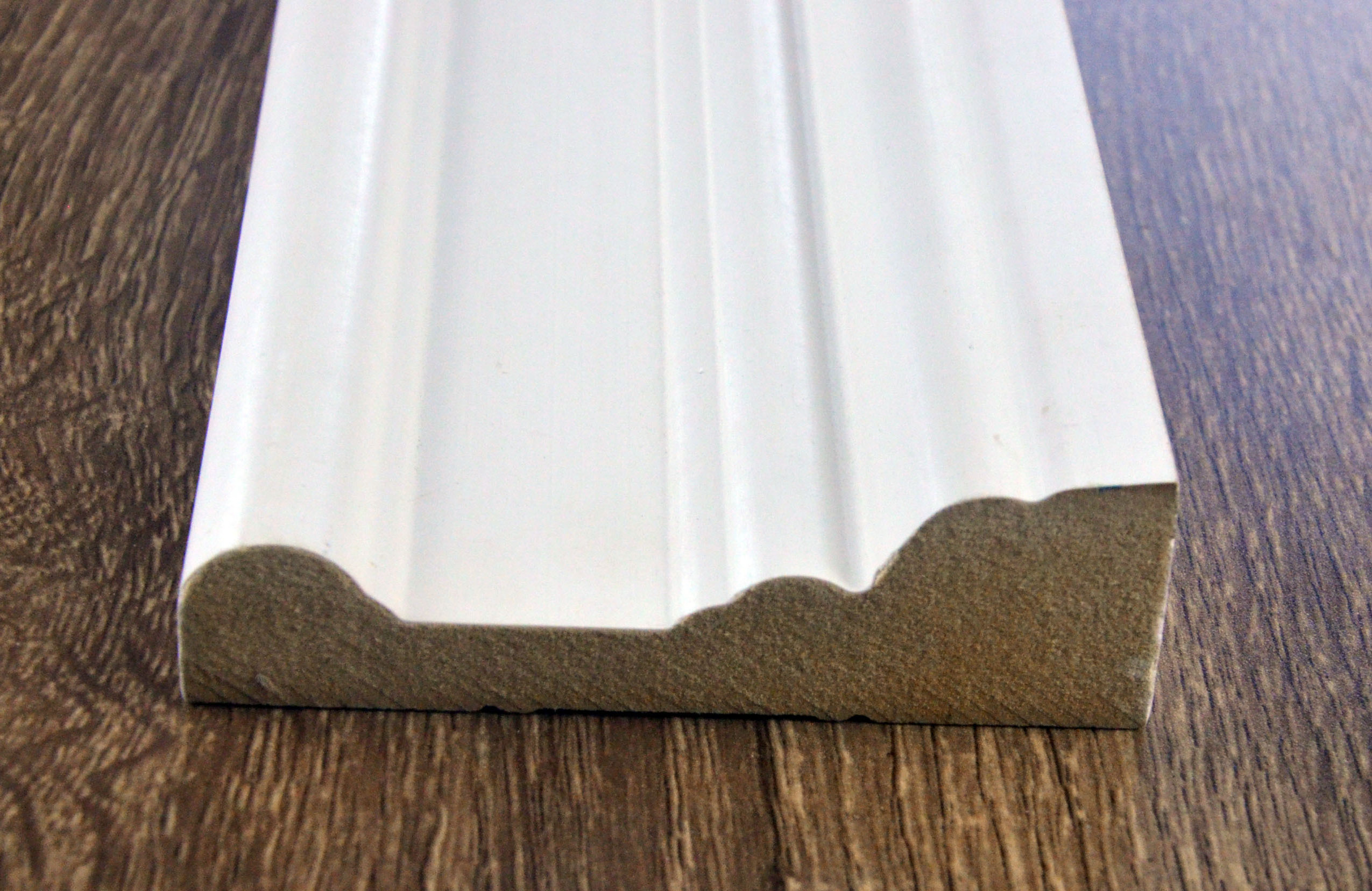 White primed decorative wood trim door casing moulding