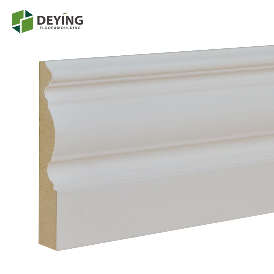 White primed wall skirting board baseboard mouldings