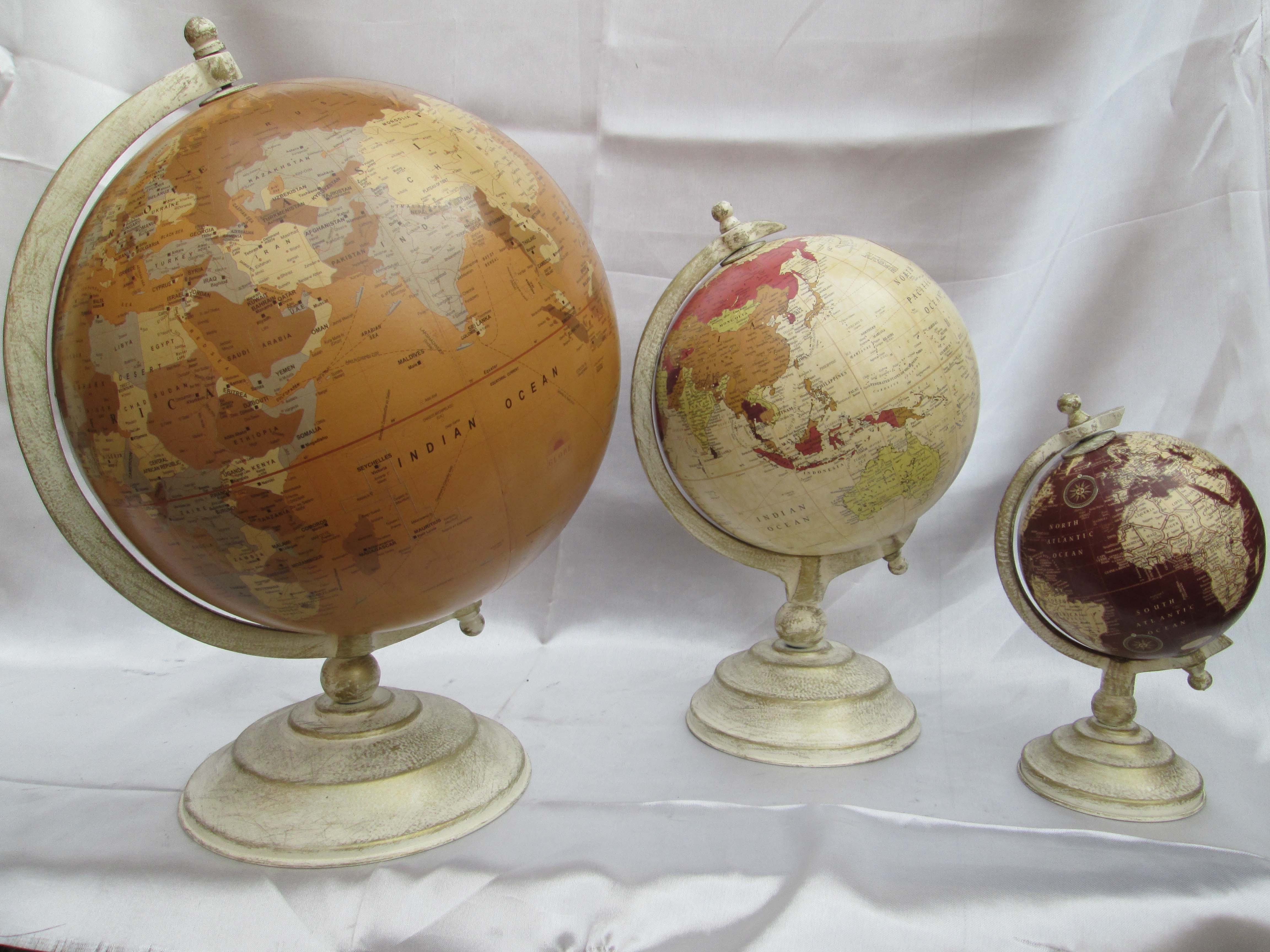 world desk globe with sea, air, road map and island