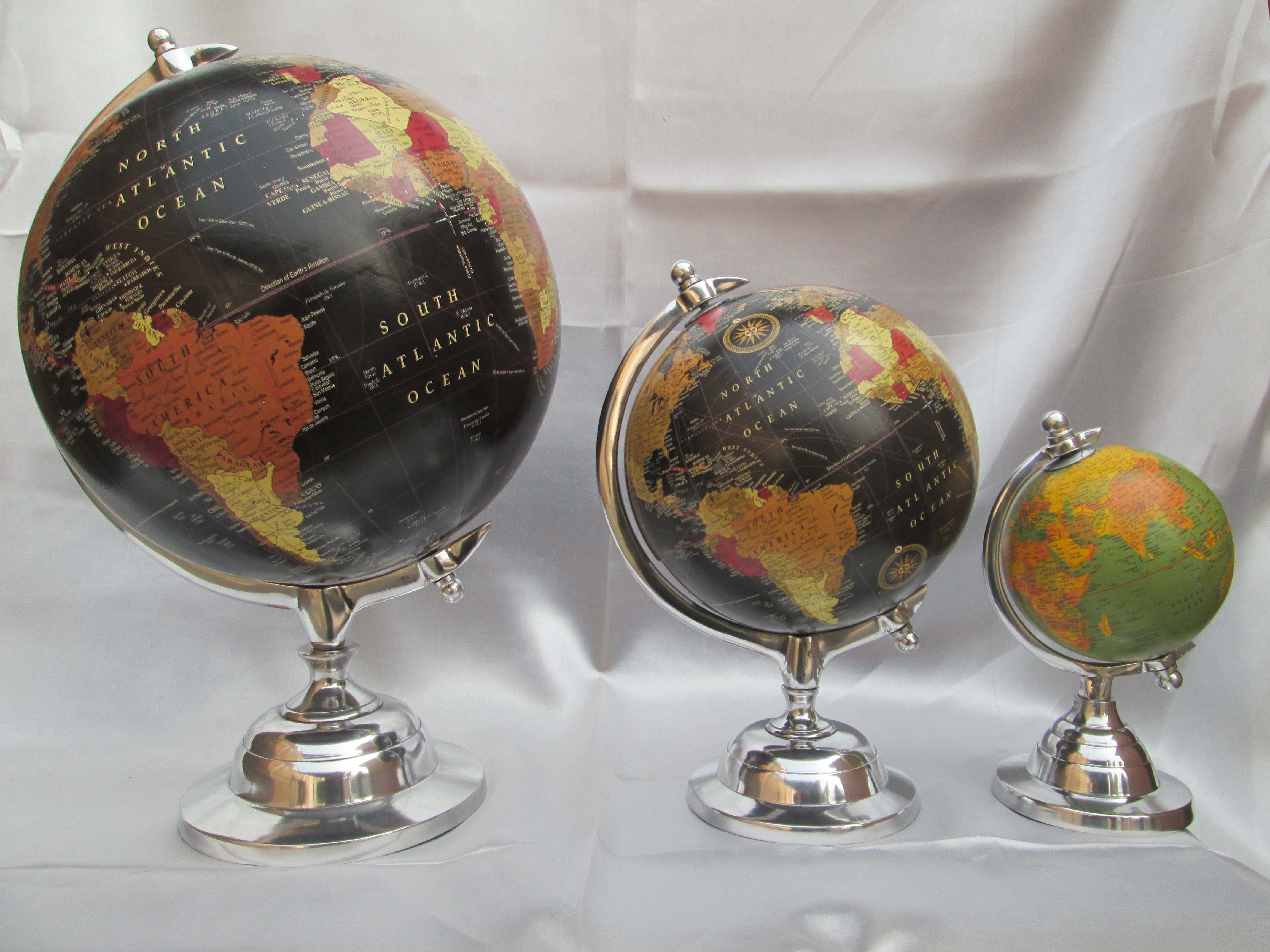 world desk globe with sea, air, road map and island