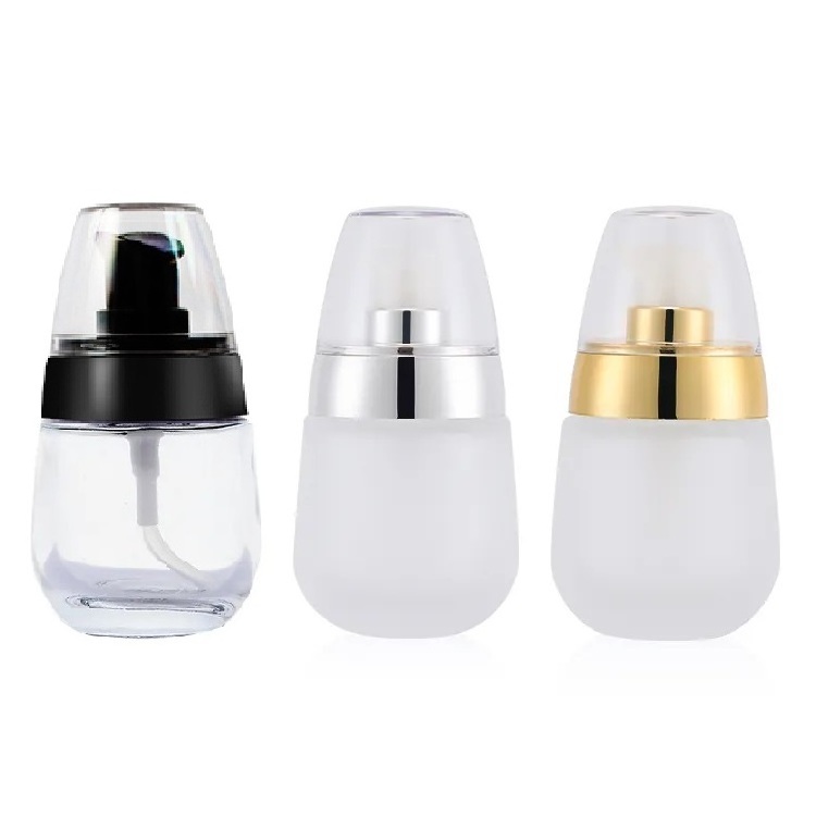 Luxury Oval Cosmetic Packaging 35ml Empty Pump Skincare Primer Liquid Lotion Foundation Glass Bottle 30ml Container Custom Logo