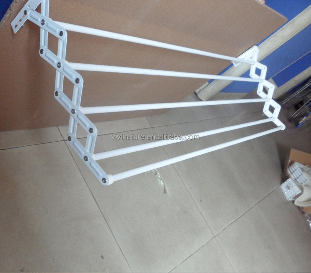 Extensible wall mounted clothes drying rack