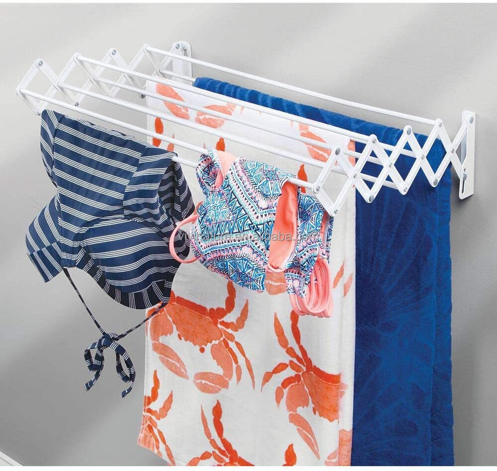 Extensible wall mounted clothes drying rack