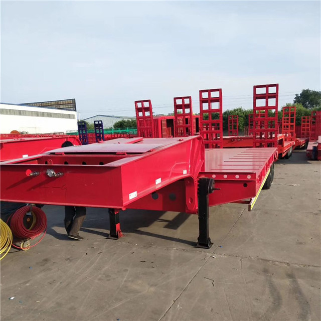 Cheap 3 Axles 60 Ton Flatbed Semi Trailer 20FT 40FT Chassis Used Container Truck For Sale