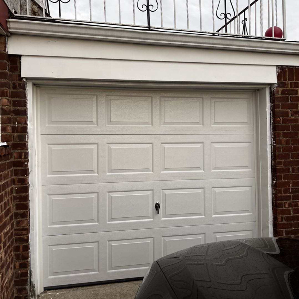 Modern 4 panel 9x7 single garage door for sale