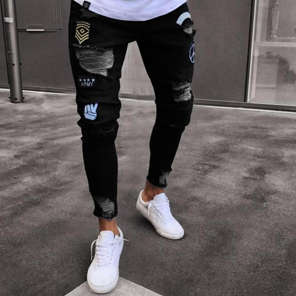 2019 Latest design in stock extreme super skinny jeans in mid wash ripped and embroidered men's denim jeans trousers