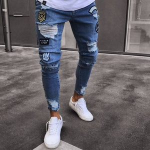 2019 Latest design in stock extreme super skinny jeans in mid wash ripped and embroidered men's denim jeans trousers