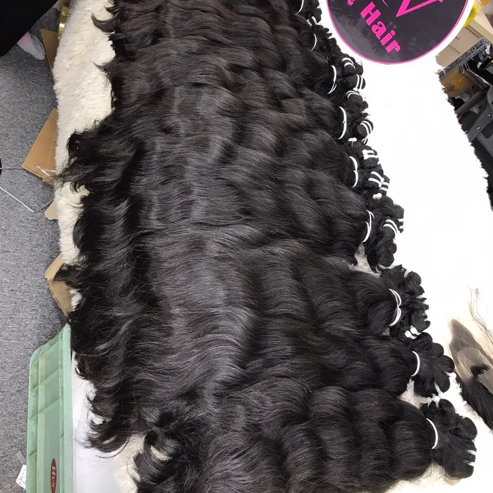 Best quality Raw Vietnamese hair direct from vietnamese temple 100% raw unprocessed wavy natural texture and color