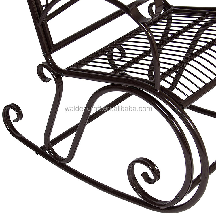 Outdoor antique wrought iron rocking chair