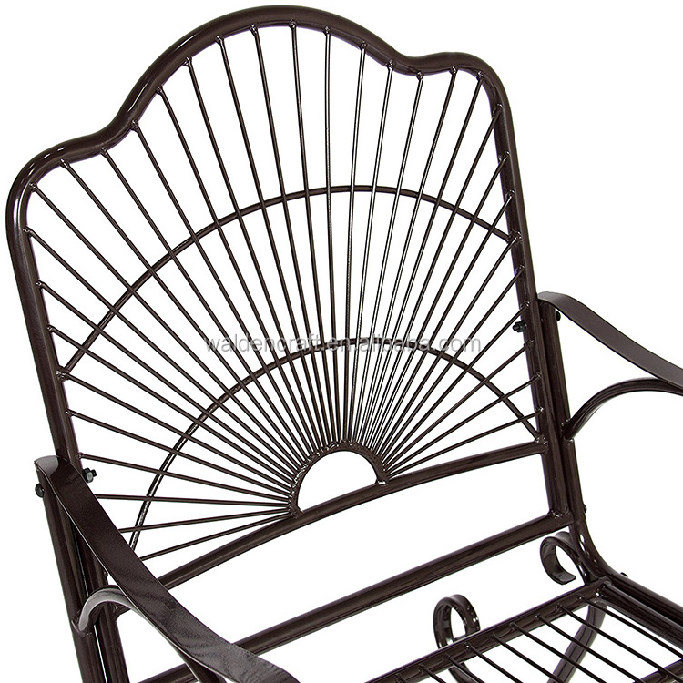 Outdoor antique wrought iron rocking chair