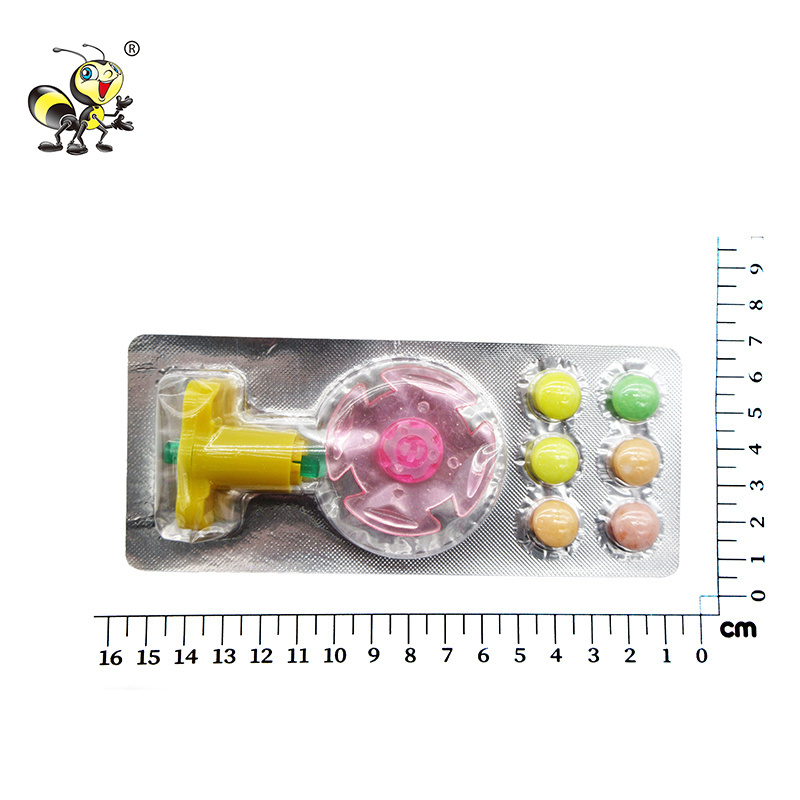 Kids cheap Spinning toy with pressed tablet candy wholesale