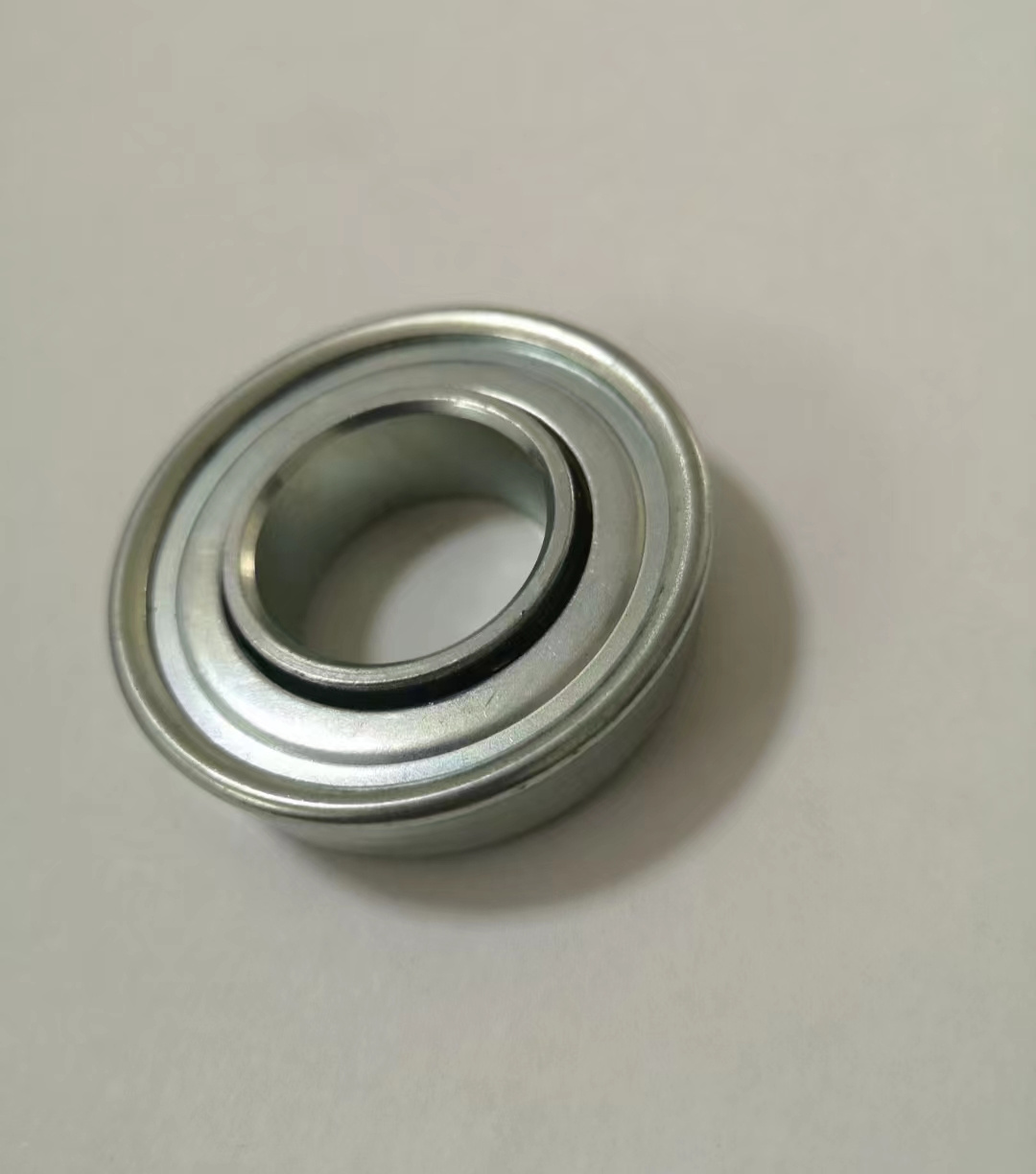 Pressed steel flange stamped bearings CB2035 used for lawn mowers, casters, wheels, handcart wheels`