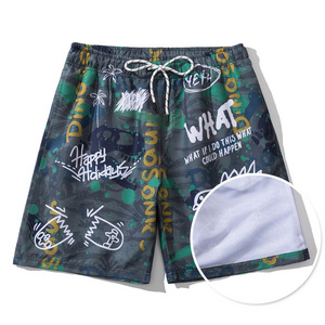 Summer oversize men's printed beach swim pants Cartoon Dinosaur Beach Shorts Male  Graffiti camouflage color inflatable  shorts