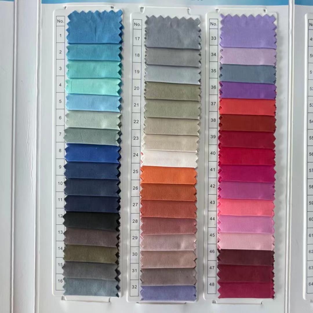 Ready goods 150 kinds of colors 15%nylon 85%polyester micro twill peach skin fabric for Jacket/downcoat