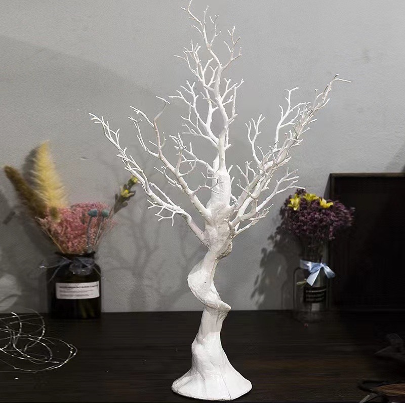 Make a simple ornament artificial plastic white Christmas tree dead branches