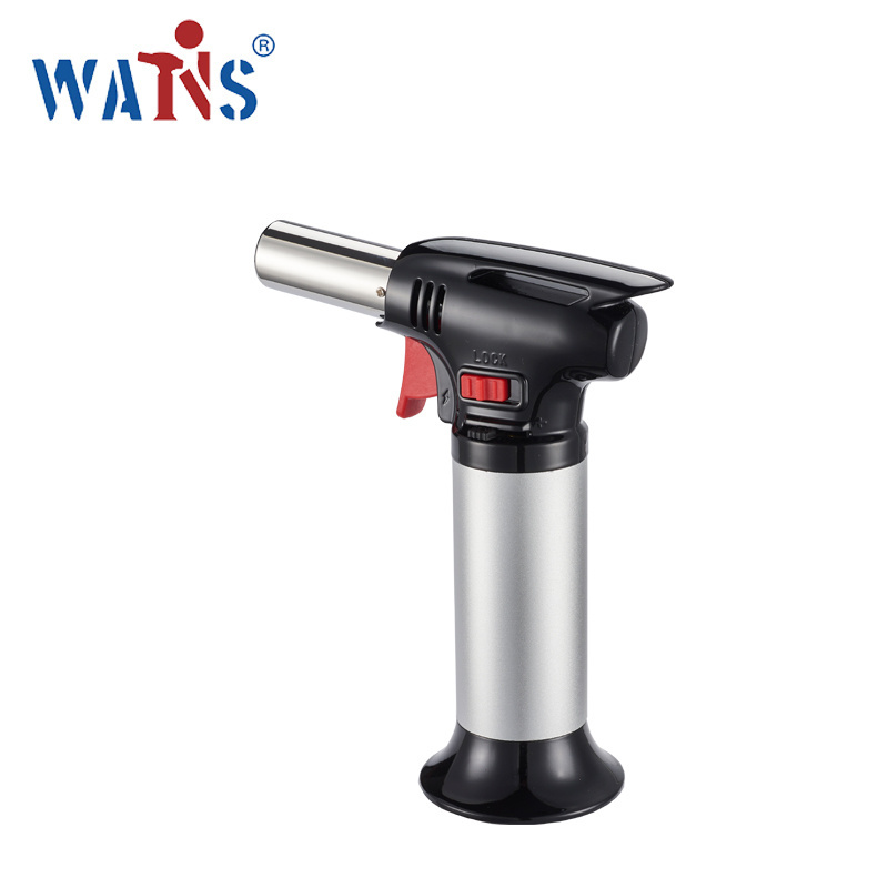 Portable custom kitchen torch for baking creme brulee with a butane flame torch lighter