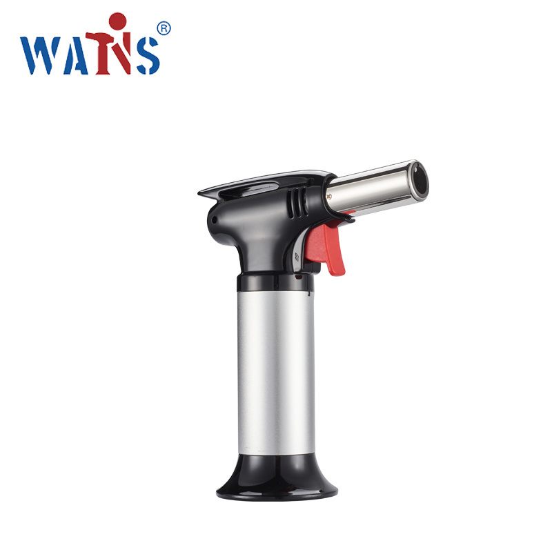 Portable custom kitchen torch for baking creme brulee with a butane flame torch lighter