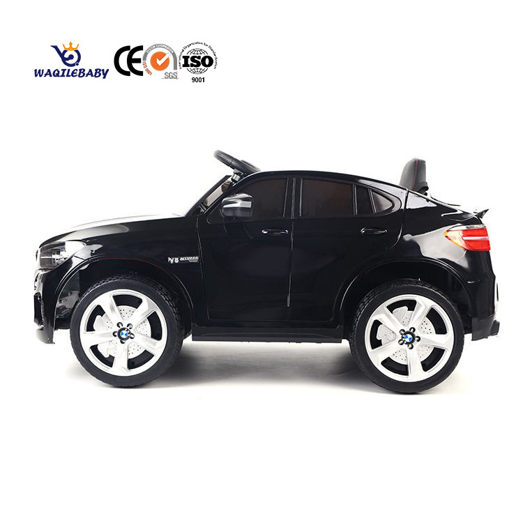 WQL Manufacture of high quality electronic toy car with swinging two-door four wheel electric car stroller toy children electric