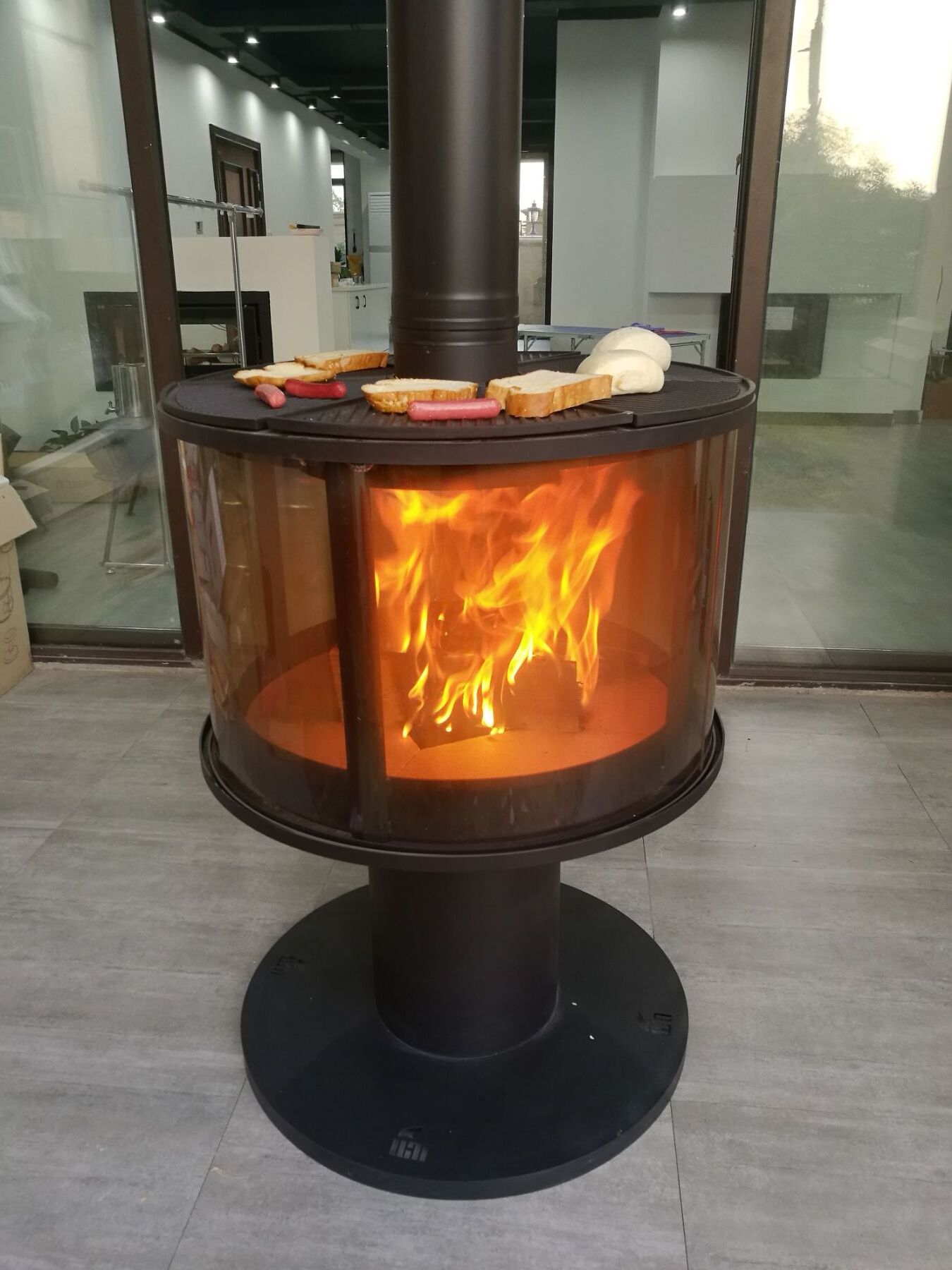 Factory supply outerdoor wood burning stove with round glass