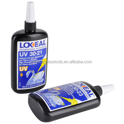 Loxeal 30.23 UV adhesive glue for bonding float glass to glass in glass and crystal furniture manufacturing.