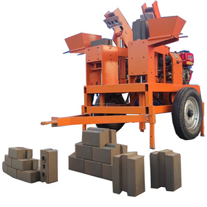 low price manual double mud clay interlocking bricks making machine