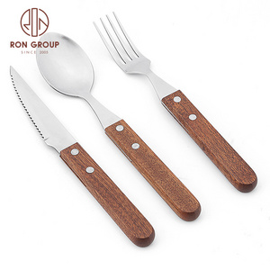 Italy Korea wedding flatware set stainless steel wooden handle knife fork cutlery set