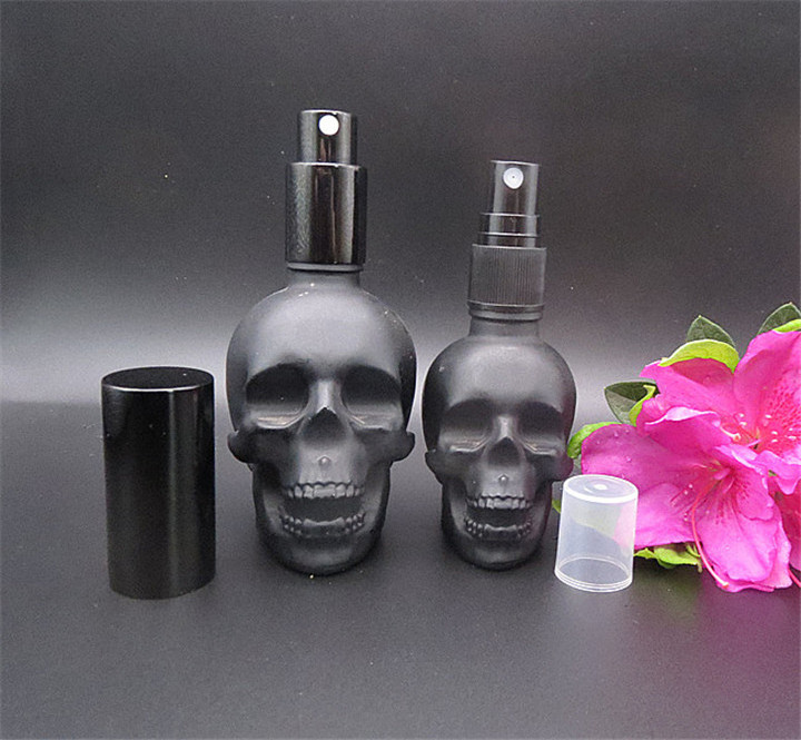 Matte black 30ml 60ml 120ml Skull Shaped Glass Perfume Bottle with Alumite/Plastic Fine Mist Spray Cap