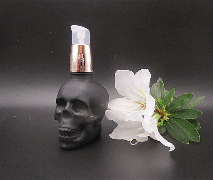 Matte black 30ml 60ml 120ml Skull Shaped Glass Perfume Bottle with Alumite/Plastic Fine Mist Spray Cap