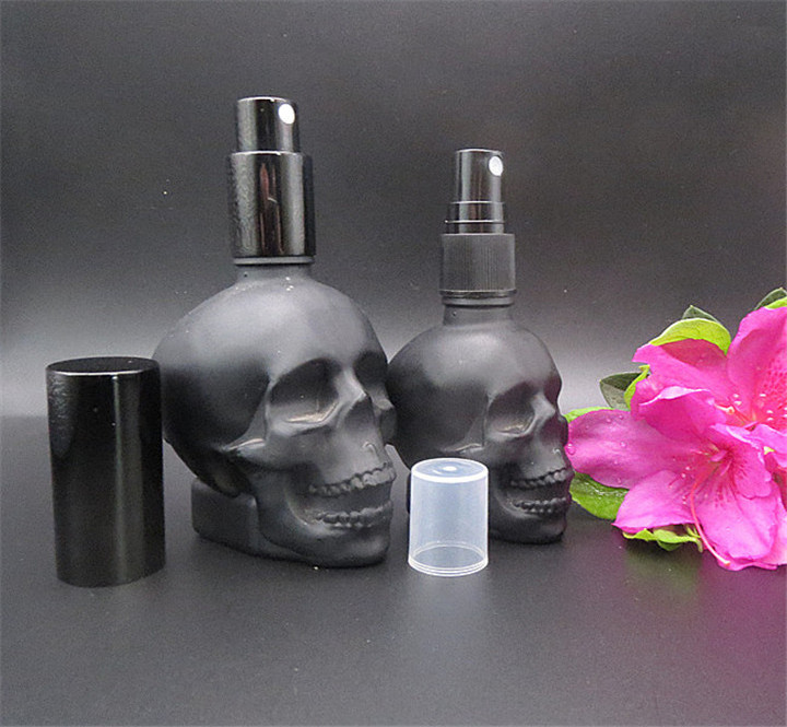 Matte black 30ml 60ml 120ml Skull Shaped Glass Perfume Bottle with Alumite/Plastic Fine Mist Spray Cap