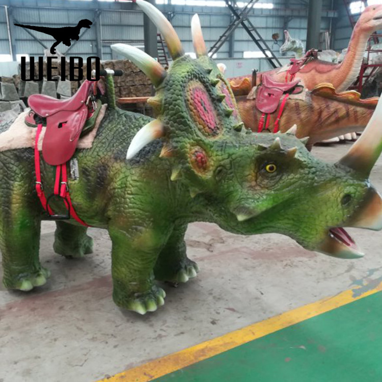 Coin operated dinosaur animatronic ride on dinosaur