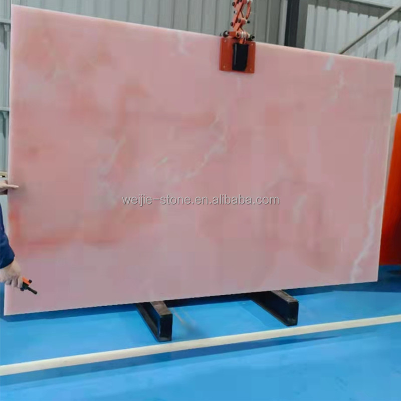 Backlit wall panels Translucent pink onyx marble slab