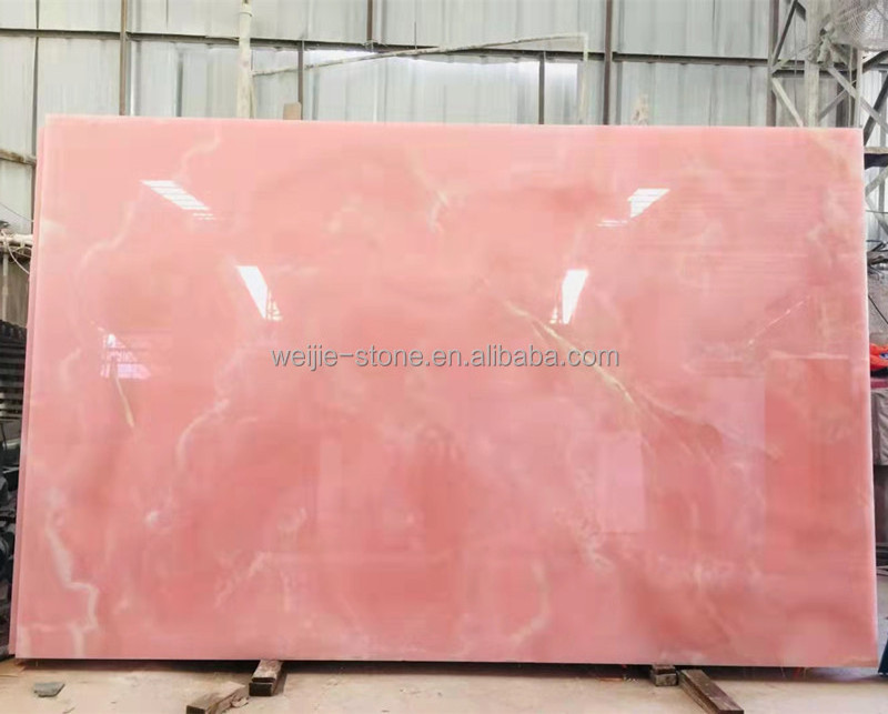 Backlit wall panels Translucent pink onyx marble slab