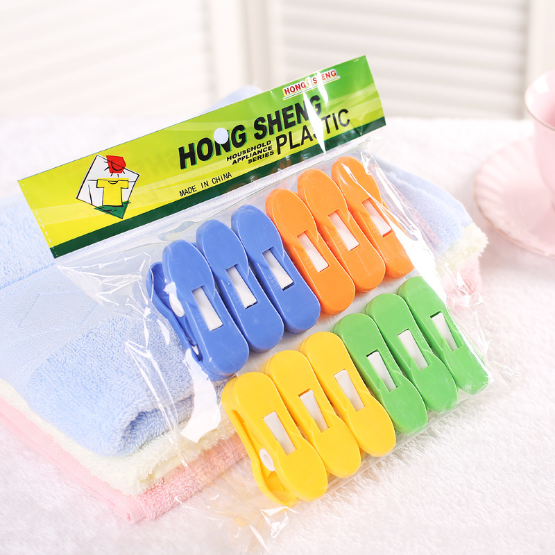 wholesale good price high quality household colorful peg design clips large beach towel pins plastic multi-function clothes pegs