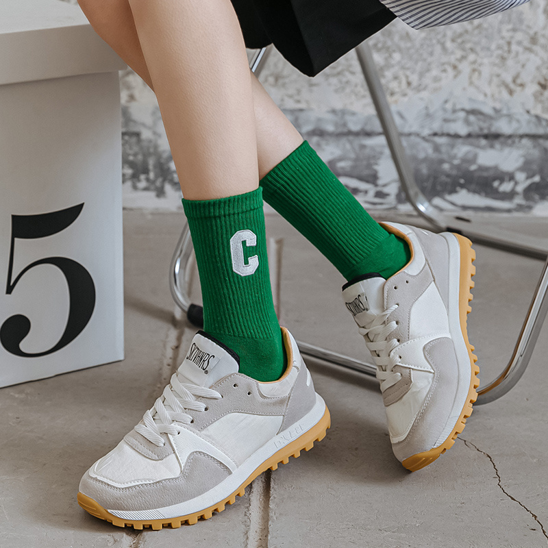 Manufacturer hot sale fashion trend letter Klein blue socks mid-calf length cotton teens socks