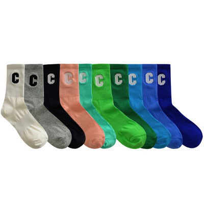 Manufacturer hot sale fashion trend letter Klein blue socks mid-calf length cotton teens socks