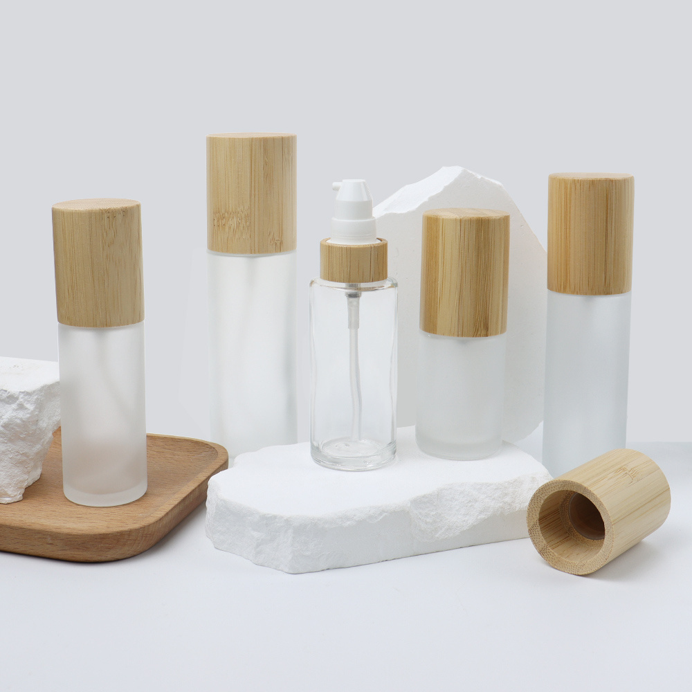 Empty bamboo cosmetic packaging 20ml 30ml 50ml 100ml 120ml frosted mist lotion pump glass oil spray bottle with wood bamboo lid