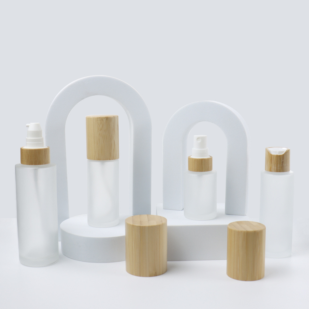 Empty bamboo cosmetic packaging 20ml 30ml 50ml 100ml 120ml frosted mist lotion pump glass oil spray bottle with wood bamboo lid