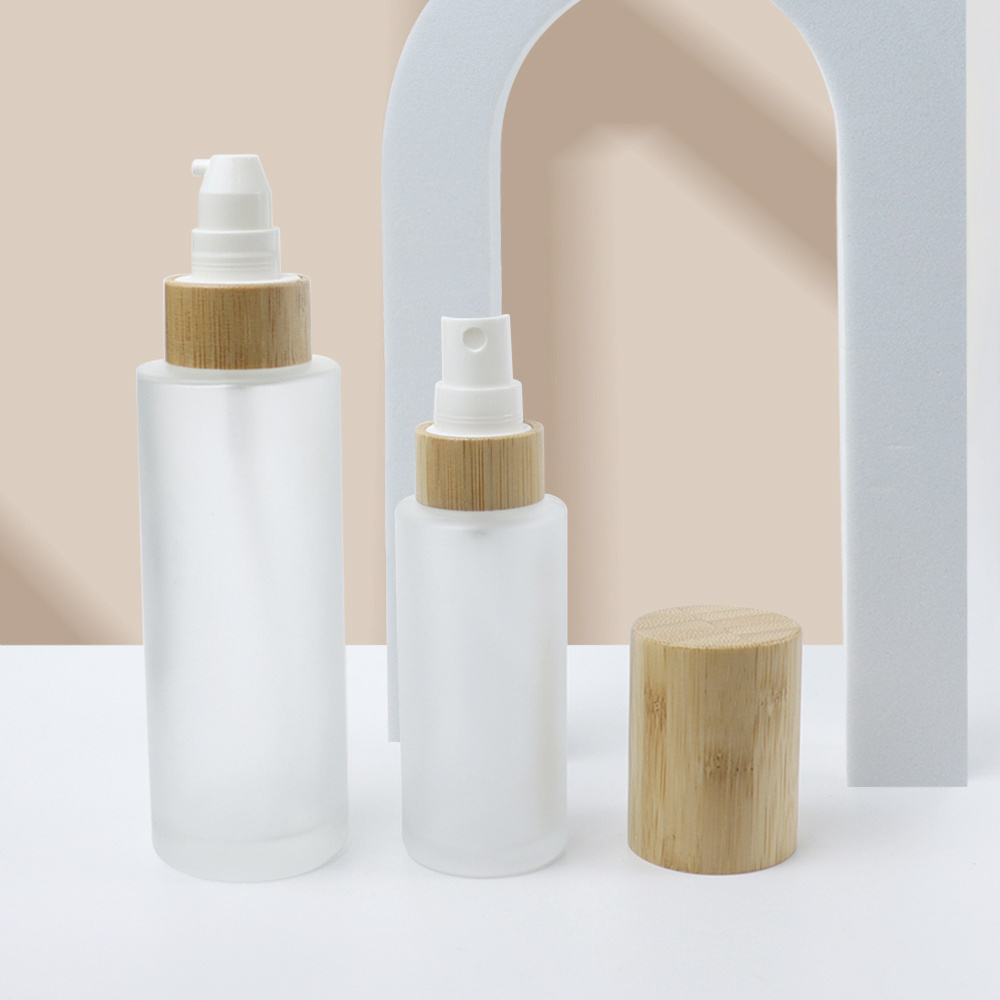 Empty bamboo cosmetic packaging 20ml 30ml 50ml 100ml 120ml frosted mist lotion pump glass oil spray bottle with wood bamboo lid