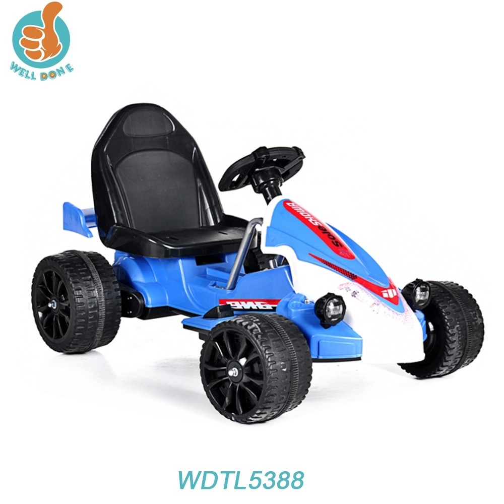 Kids ride on pedal go kart with rubber tires