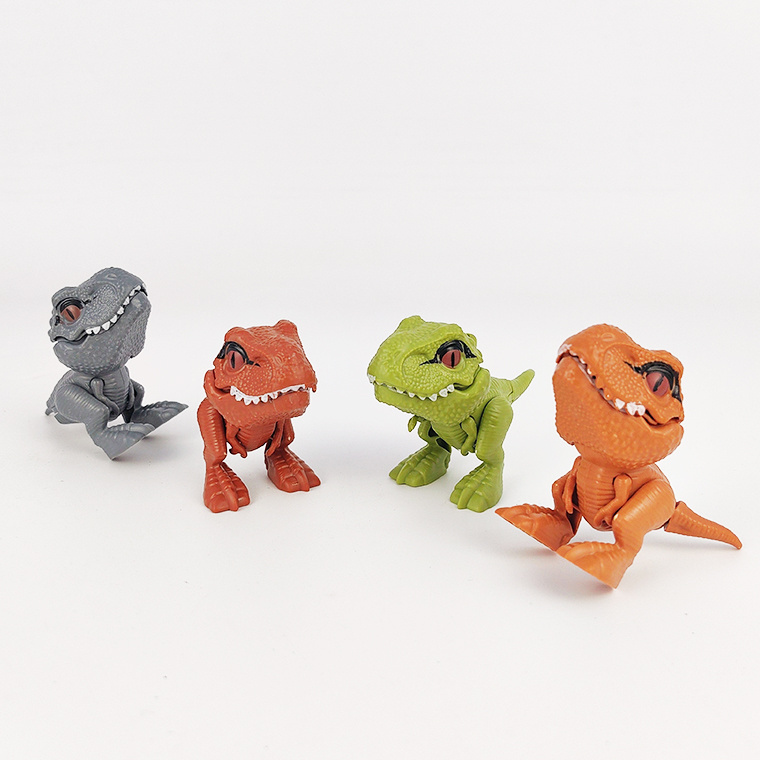 Hot selling promotional mini plastic novelty gifts tyrannosaurus rex finger bite biting dinosaur toys for kids boys girls