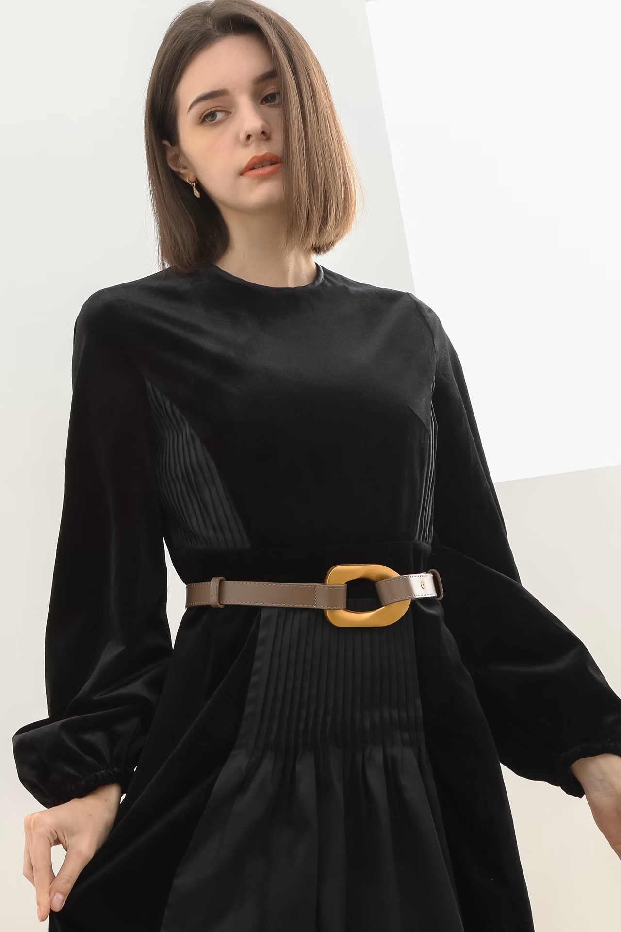 Dress Featuring Panels of Velvet and Leather