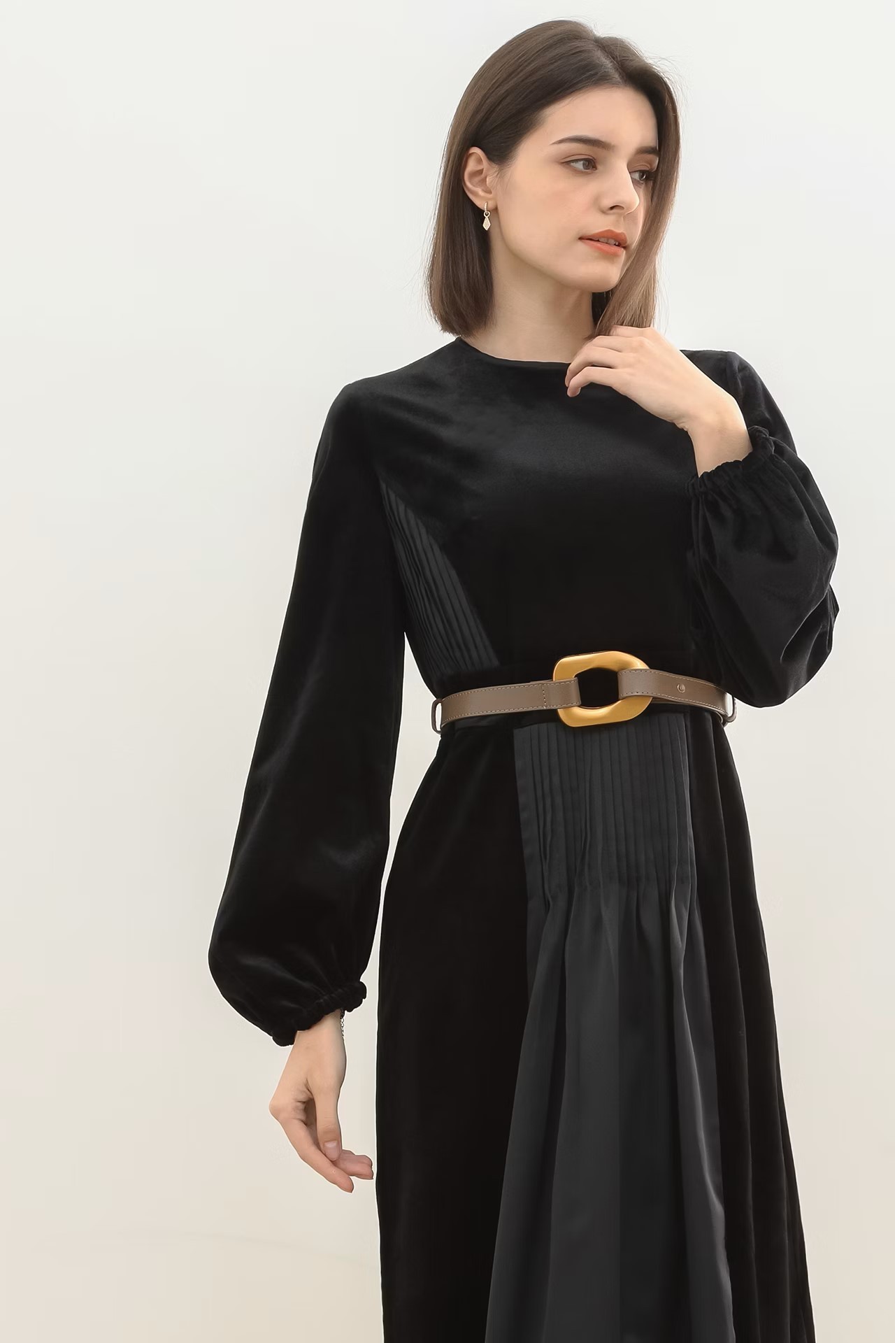 Dress Featuring Panels of Velvet and Leather