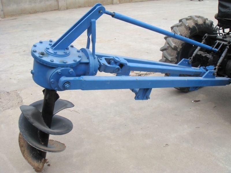 Farm tractor mounted hole digger tree planting drilling machine